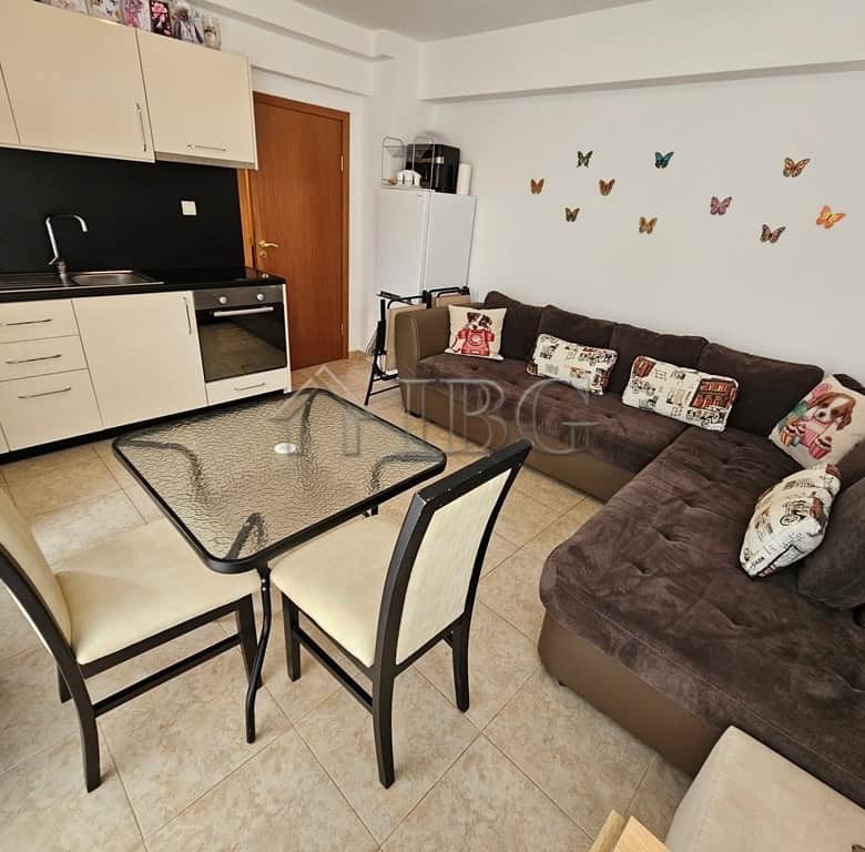 Interior view of a 1-bedroom apartment with a living room, dining area, and kitchen in Sveti Vlas.