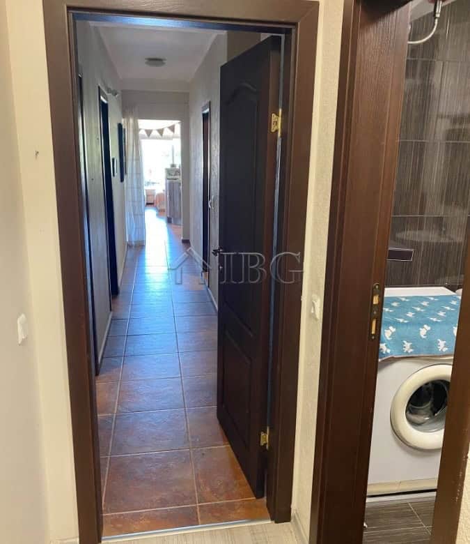 Bright hallway leading to living room in Sveti Vlas apartment.