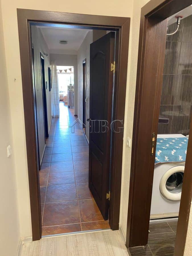 Bright hallway leading to living room in Sveti Vlas apartment.