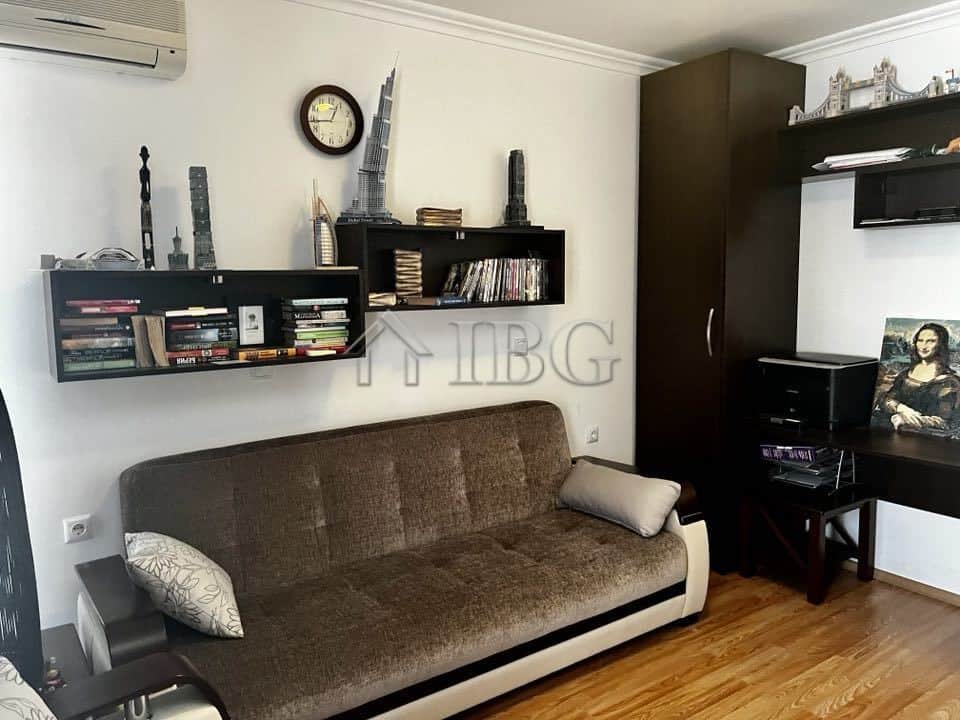 Bright living room with modern decor and bookshelf in Sveti Vlas property.