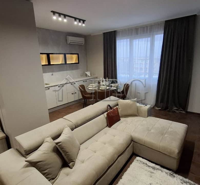 Bright living room with modern furniture and large windows in Nessebar.