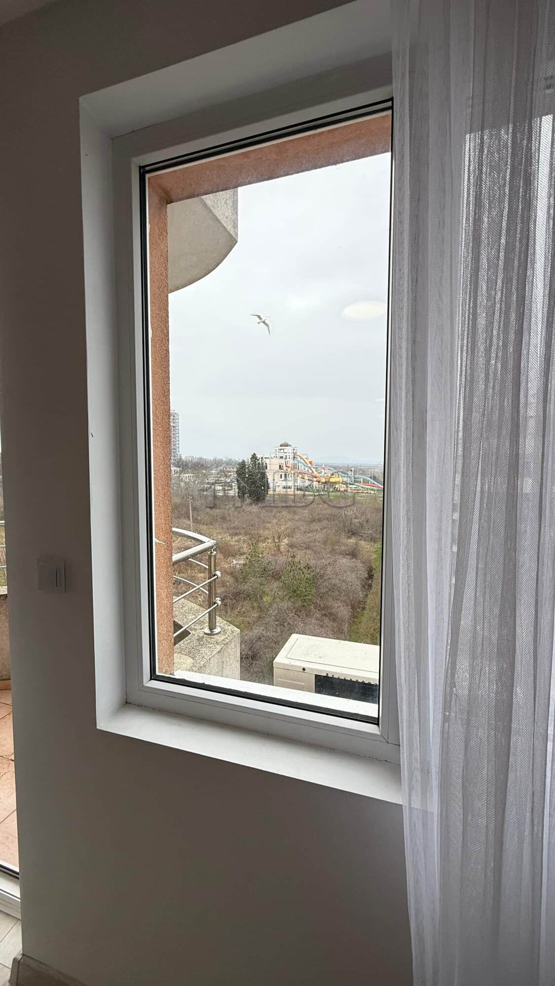 View from a 1-bedroom apartment window overlooking Pomorie Beach Resort.