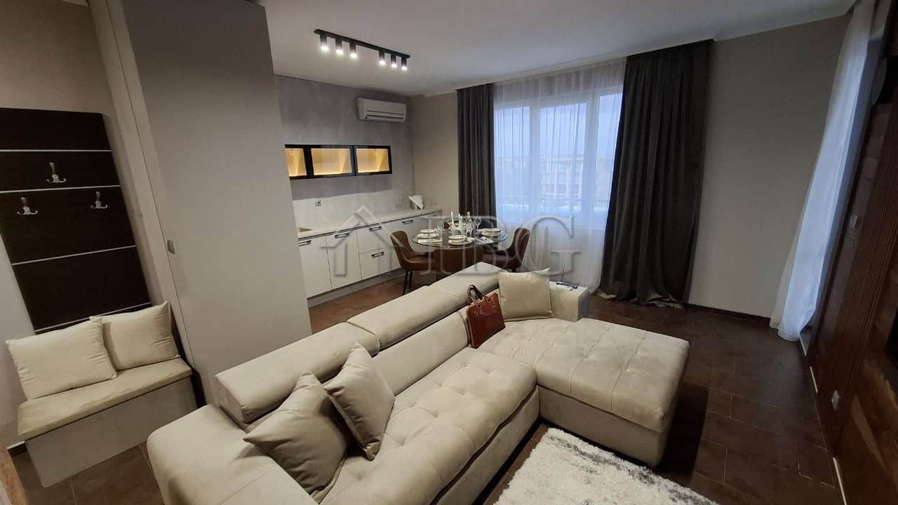 Bright living room with modern furniture and large windows in Nessebar.