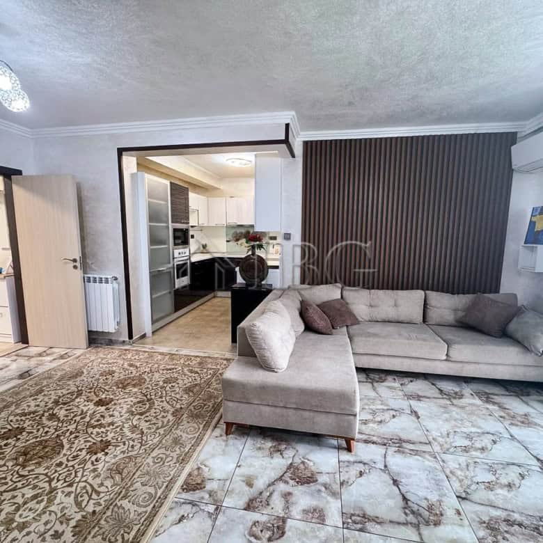 Spacious living room with sea views, stylish decor, and comfortable seating in Victoria Hill.