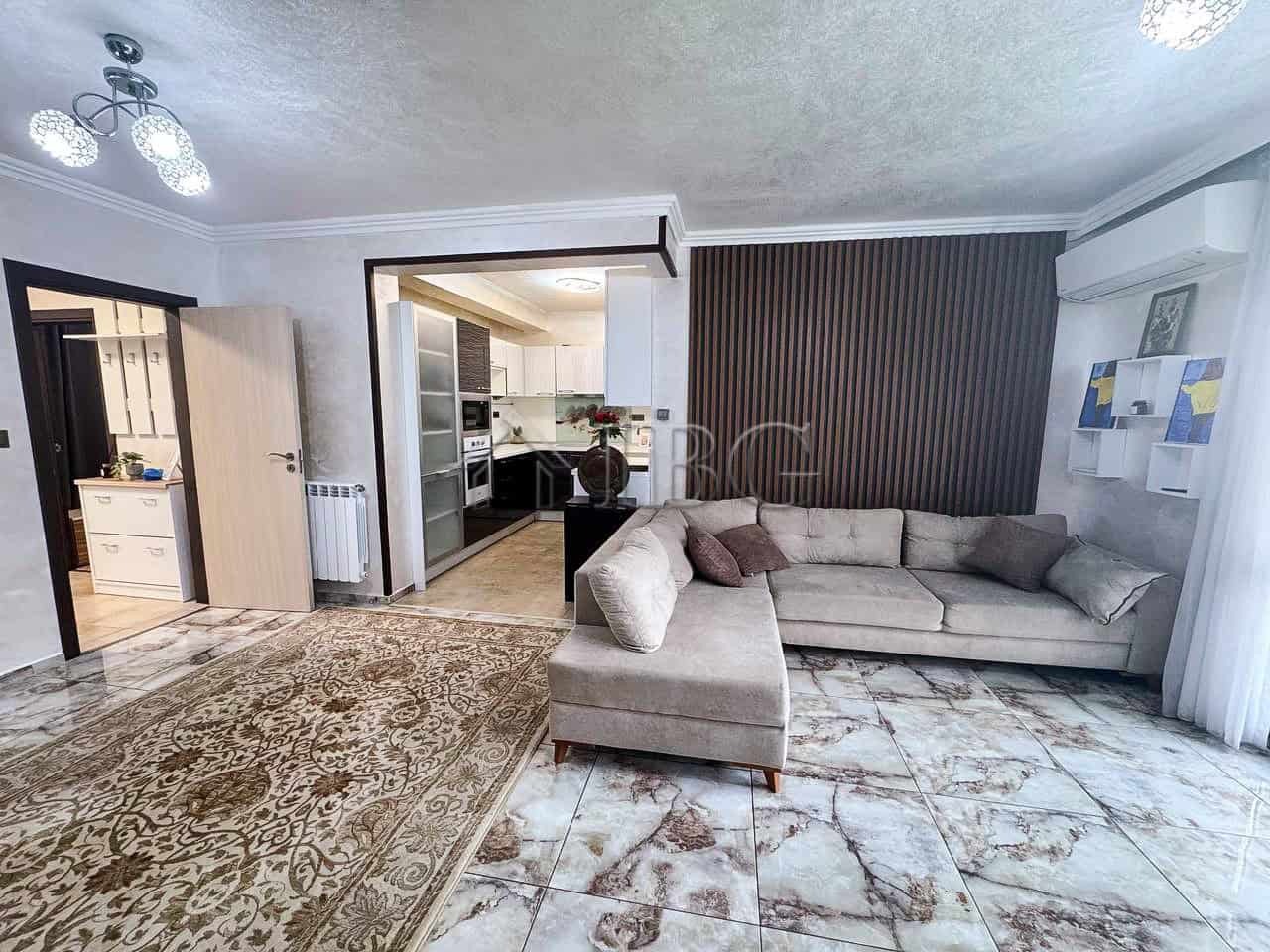 Spacious living room with sea views, stylish decor, and comfortable seating in Victoria Hill.