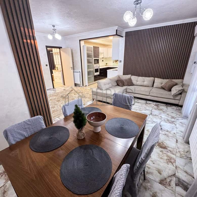 Spacious living room with sea views, stylish decor, and comfortable seating in Victoria Hill propert.