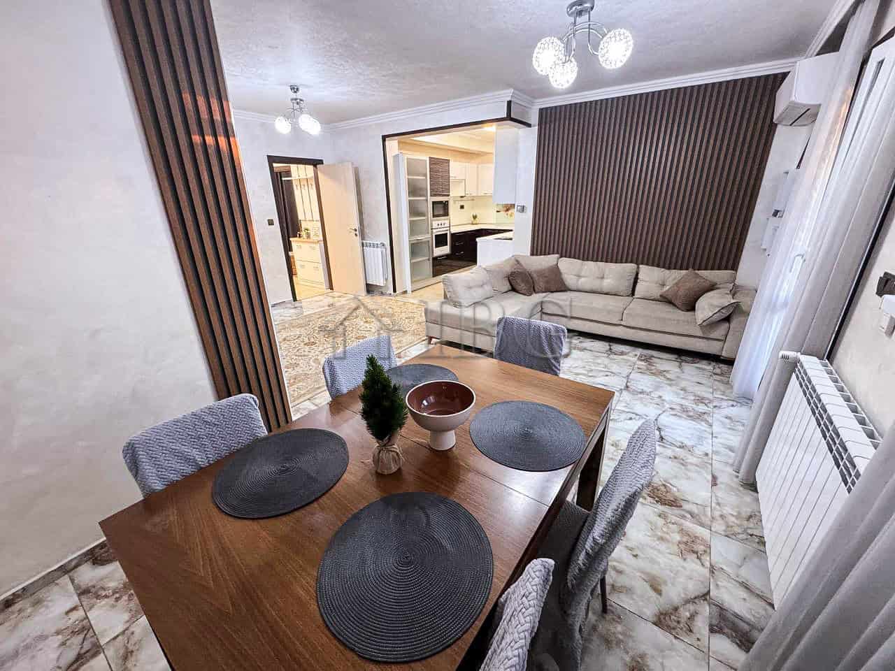Spacious living room with sea views, stylish decor, and comfortable seating in Victoria Hill propert.