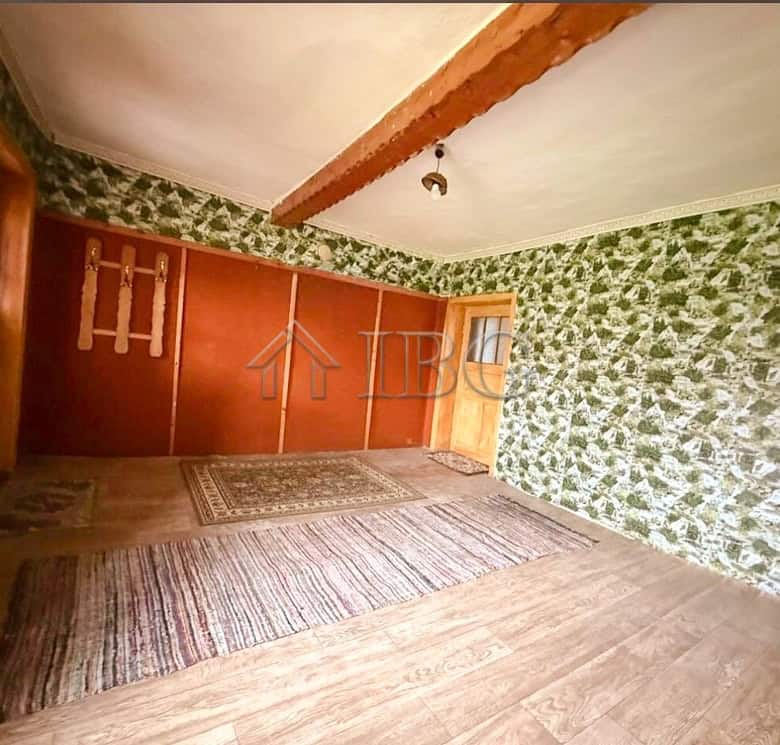 Interior view of a partly renovated house with outbuildings near the sea and General Toshevo.