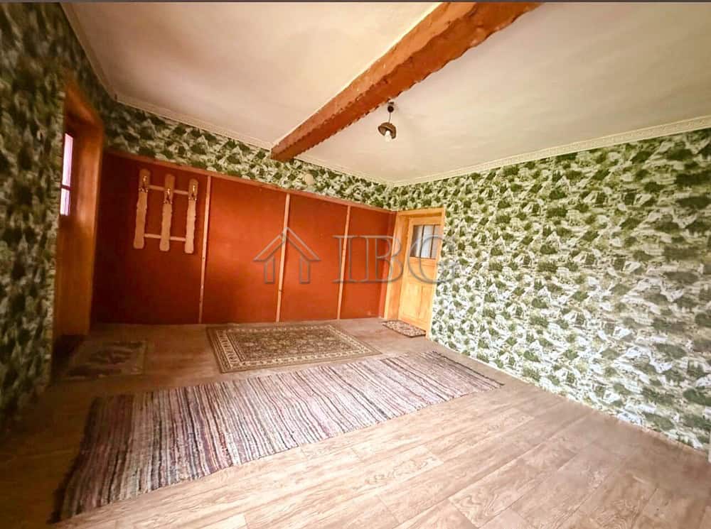Interior view of a partly renovated house with outbuildings near the sea and General Toshevo.