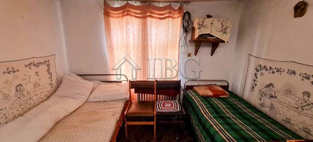 Interior of a cozy two-storey house with garden in Aleksandrovo village, Bulgaria.