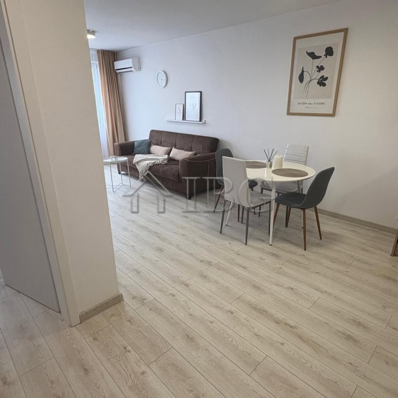 Bright 1-bedroom apartment in Pomorie Beach Resort with stylish living area and modern decor.