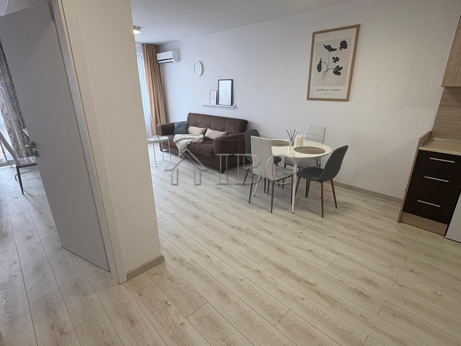 Bright 1-bedroom apartment in Pomorie Beach Resort with stylish living area and modern decor.