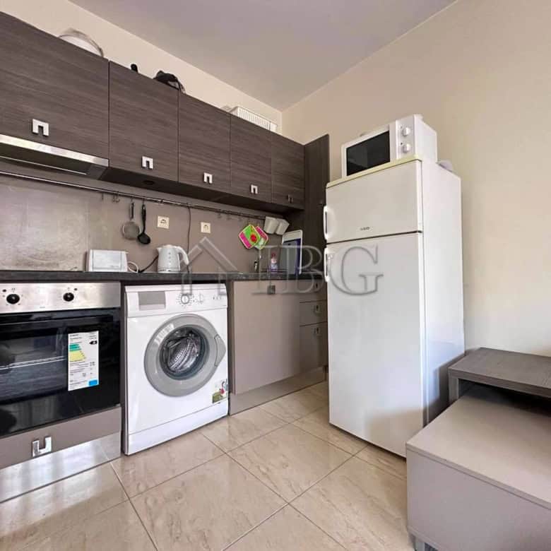 Modern kitchen in a Sveti Vlas one-bedroom apartment with appliances and cabinetry.