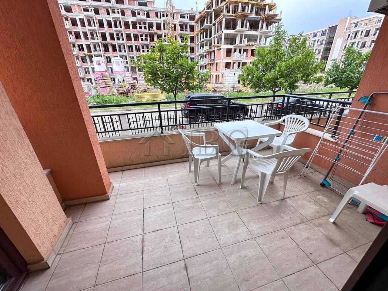 Cozy one-bedroom apartment balcony in Sveti Vlas Balcony of a one-bedroom apartment in Star Dreams Complex, Sveti Vlas, with outdoor furniture and sc.
