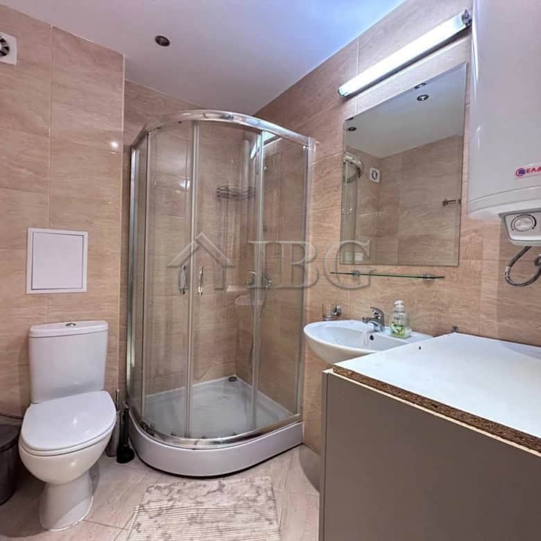 Cozy bathroom in Star Dreams Complex, Sveti Vlas, featuring a shower, toilet, and modern fixtures.