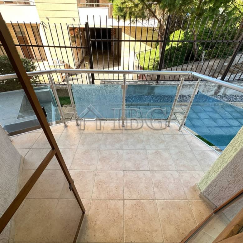 Balcony view of swimming pool in Sveti Vlas complex.