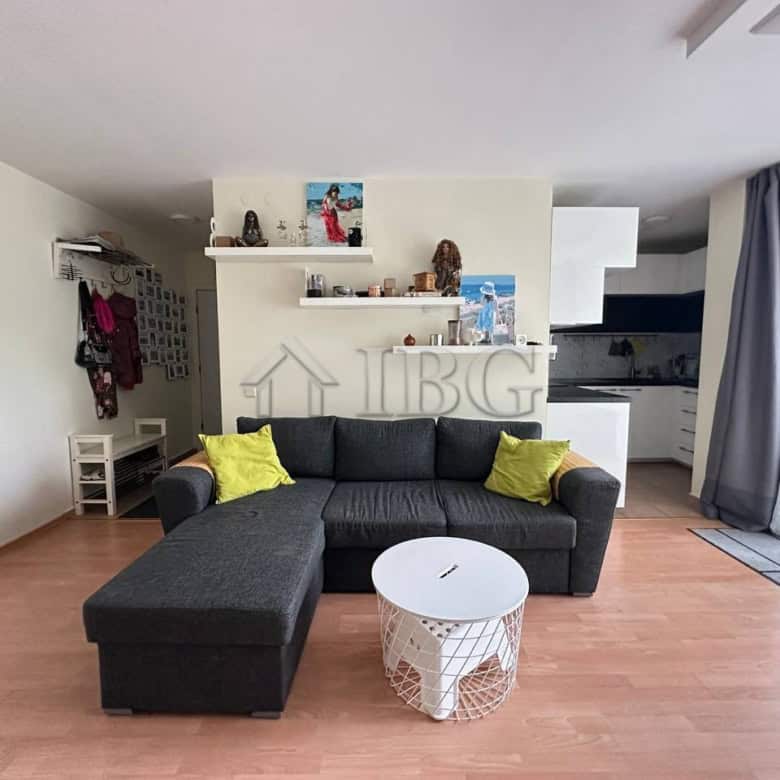 Bright living room with garden view and modern decor.