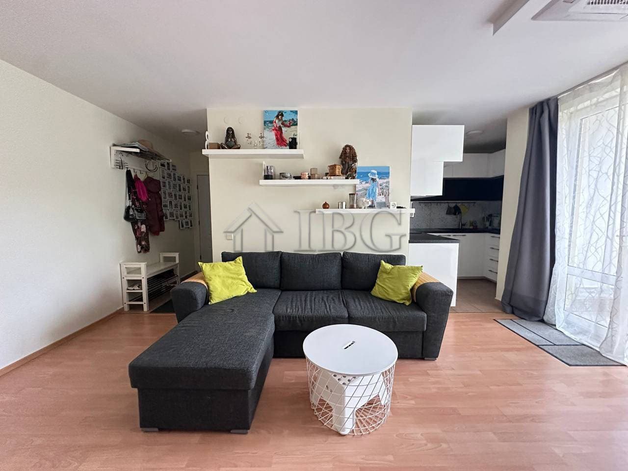 Bright living room with garden view and modern decor.