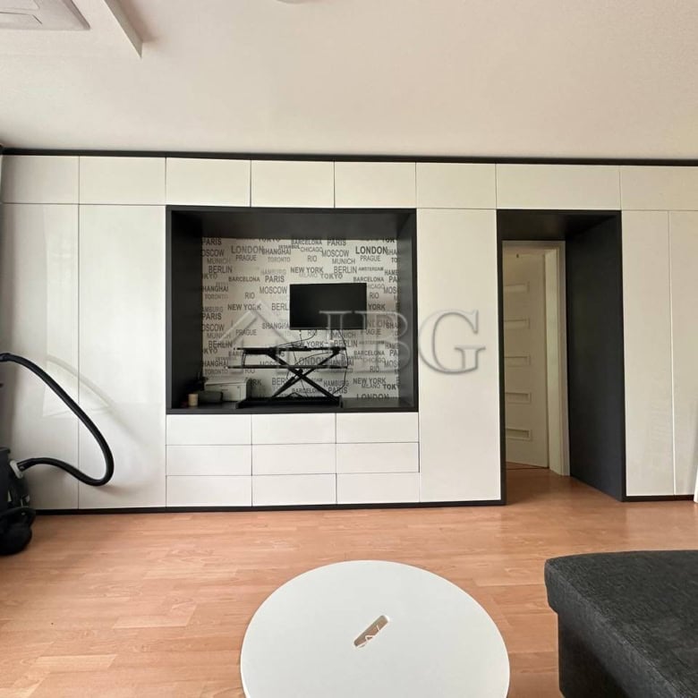 Bright 1-bedroom apartment with garden view in Sveti Vlas, featuring a sleek living area and contemp.