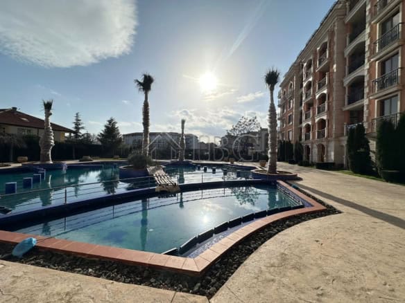 Pool with direct access and scenic surroundings near the sea.