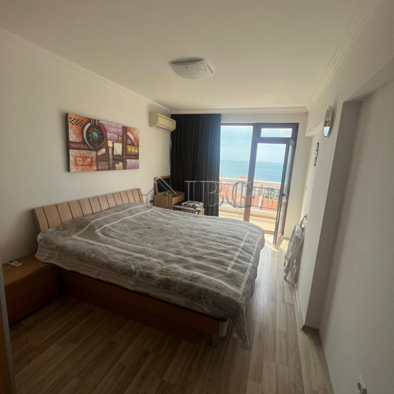 Sea view bedroom in Sveti Vlas with balcony access and natural light.