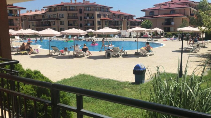 Pool with sun loungers and umbrellas at Star Dreams resort, Sveti Vlas, close to the sea.