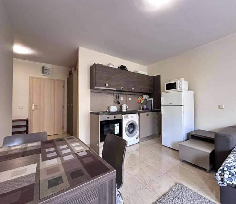 Bright interior of a 1-bedroom apartment near the sea in Sveti Vlas, featuring modern furnishings an.