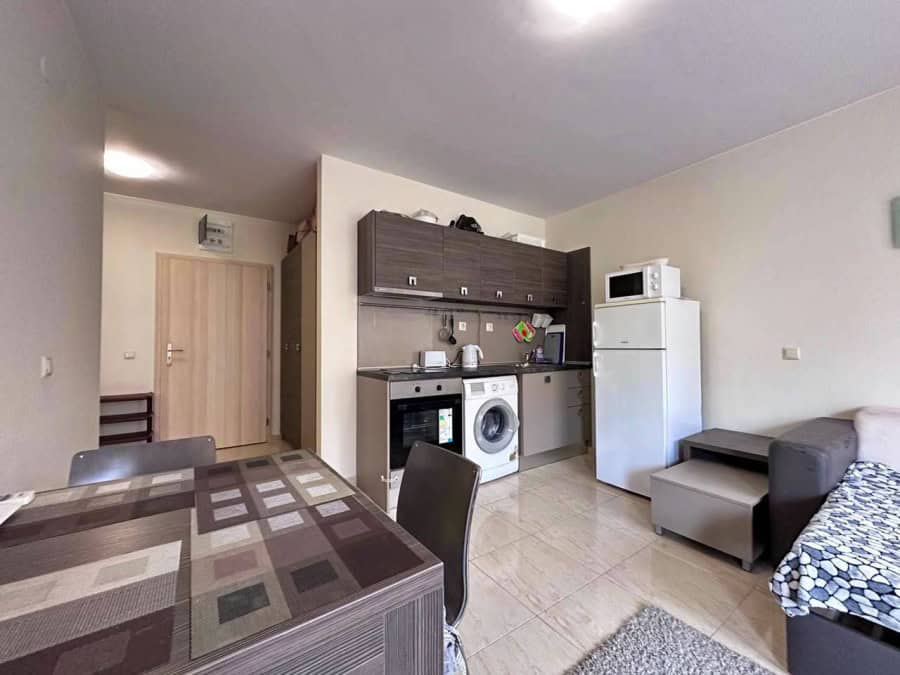 Bright interior of a 1-bedroom apartment near the sea in Sveti Vlas, featuring modern furnishings an.