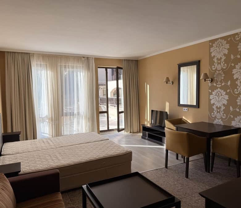 Spacious studio with large terrace, pool view, and bright interior in Sunny Beach.