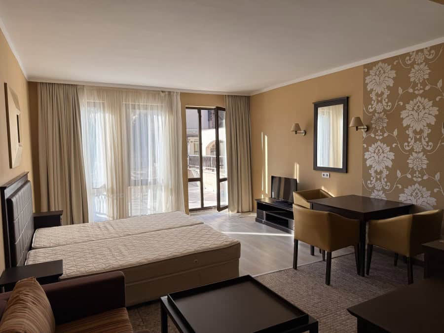Spacious studio with large terrace, pool view, and bright interior in Sunny Beach.
