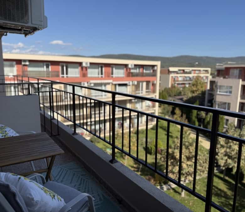 Top floor studio apartment with balcony overlooking Sunny Beach surroundings.