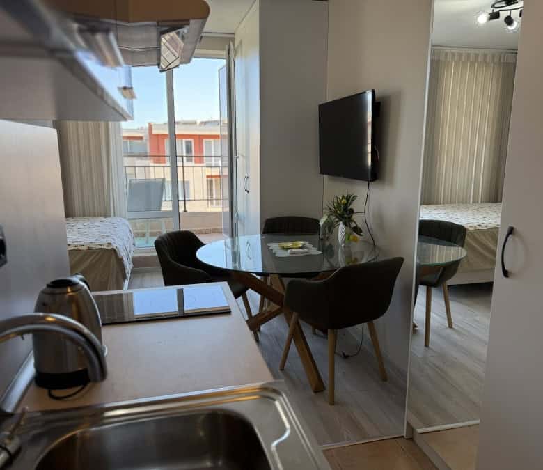 Bright studio apartment with balcony and modern furnishings in Holiday Fort Club. Perfect for holida.