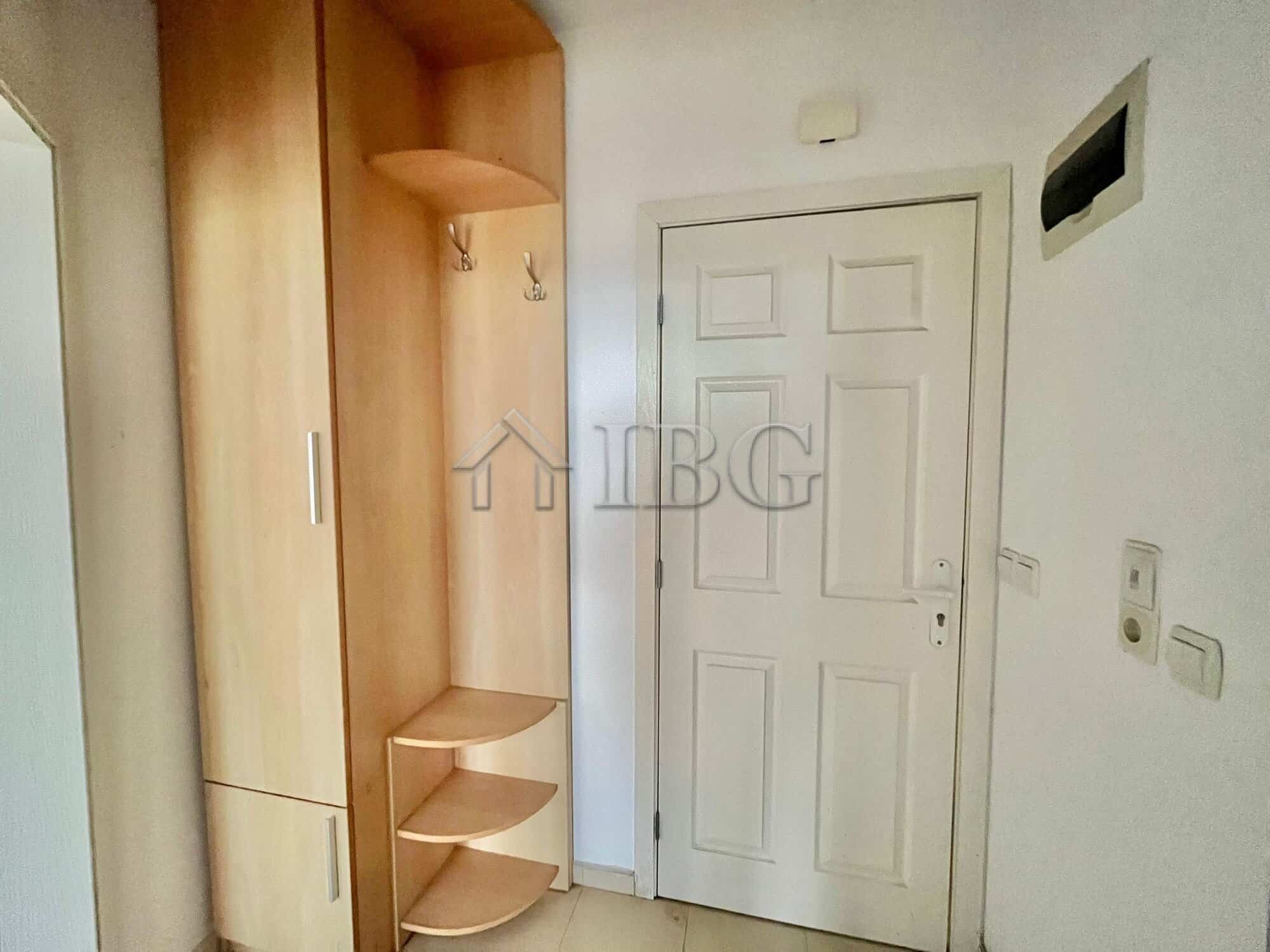 Bright interior of a 1-bedroom apartment with sea and green area views in Sveti Nikola Complex.