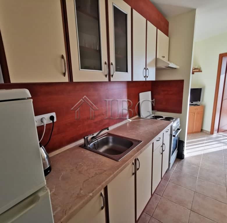 Bright kitchen with sink, cabinets, and appliances in Imperial Fort Club, Sveti Vlas.