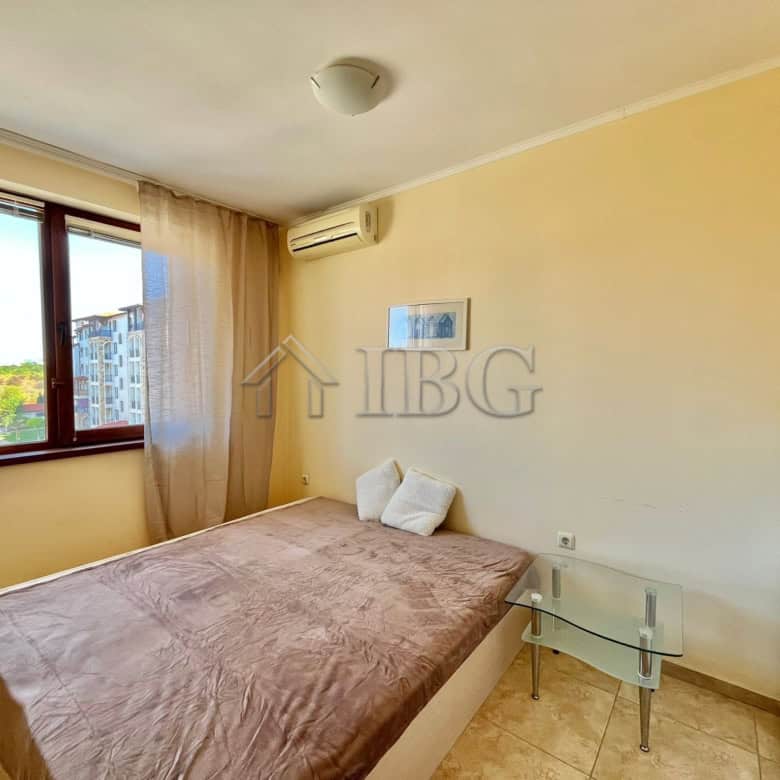 Bright interior of a 3-bedroom apartment in Apollon 4, Ravda, with large windows and modern furnishi.