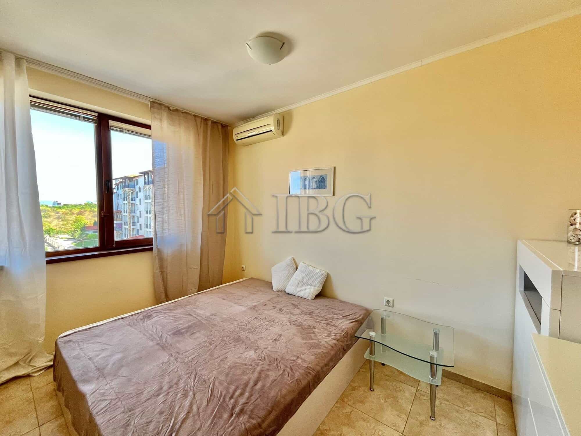 Bright interior of a 3-bedroom apartment in Apollon 4, Ravda, with large windows and modern furnishi.