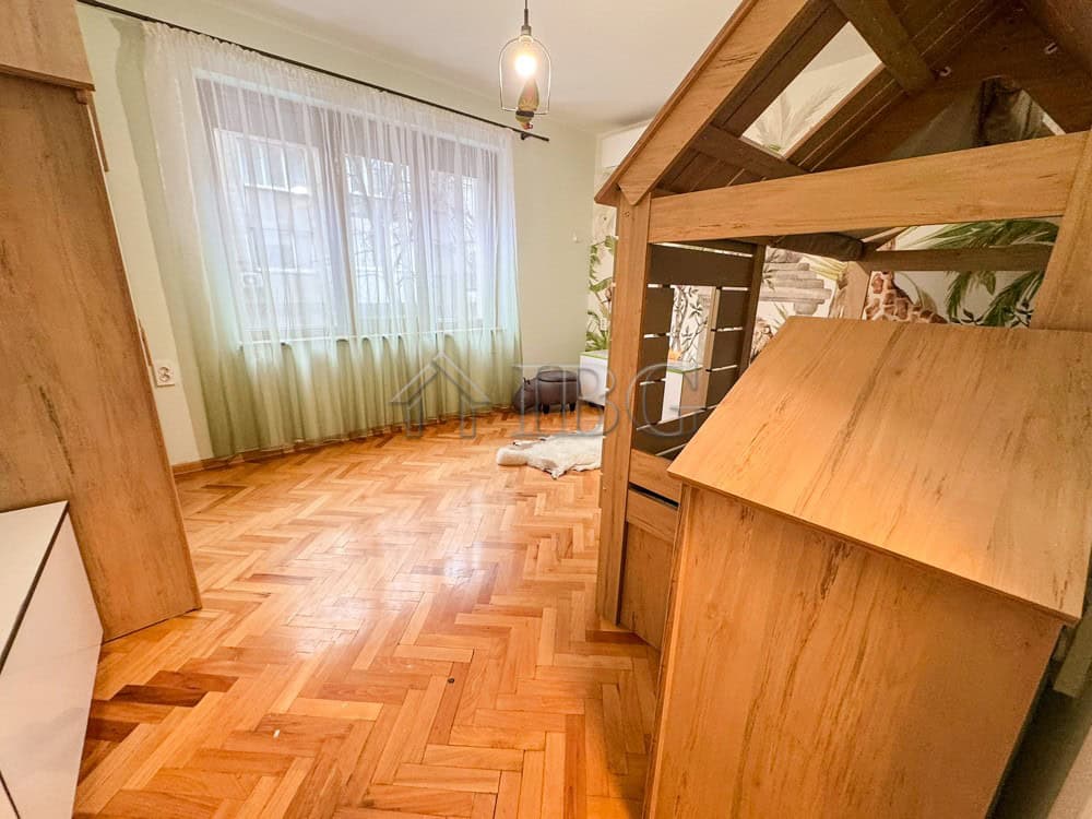 Apartment with wooden bunk beds and spacious living area in Hushove quarter, Ruse.