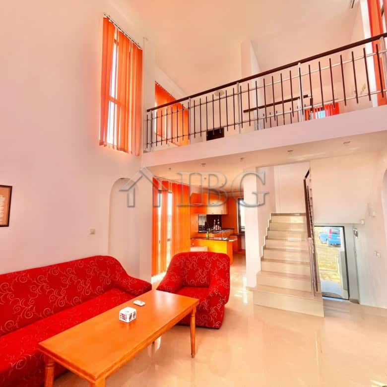 Bright living room with high ceilings and large windows in Aleksandrovo, Burgas.