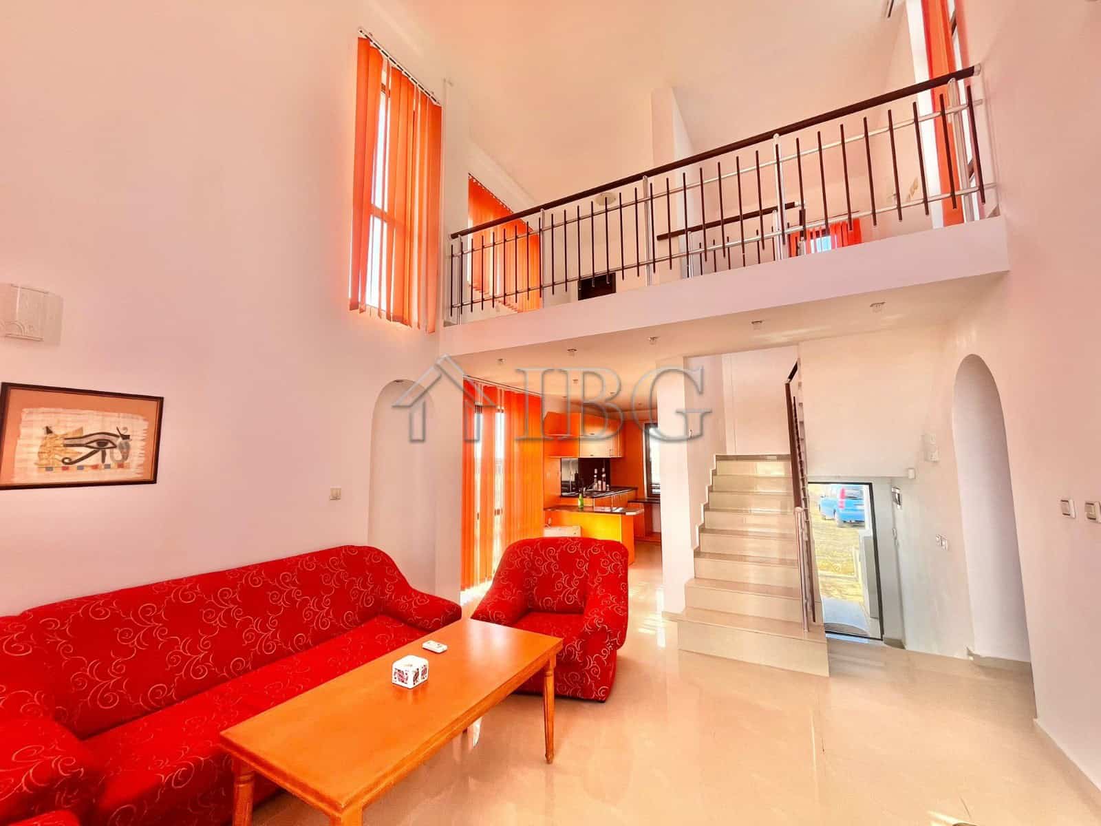 Bright living room with high ceilings and large windows in Aleksandrovo, Burgas.