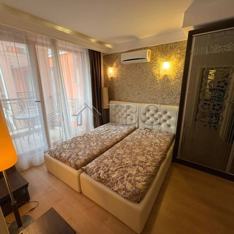 Spacious apartment with two bedrooms and pool views in Sunny Beach's Harmony Palace. Perfect for rel.