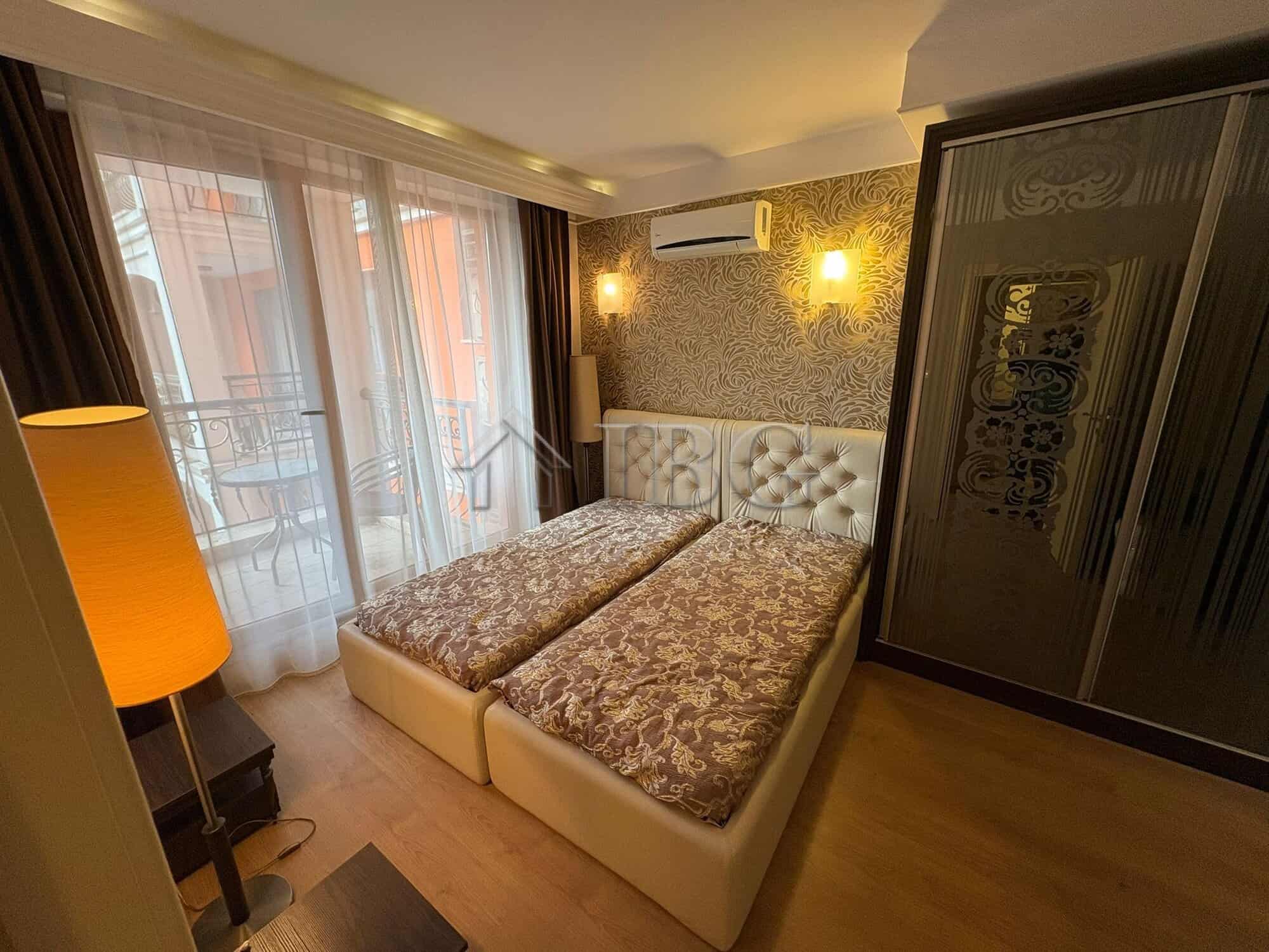 Spacious apartment with two bedrooms and pool views in Sunny Beach's Harmony Palace. Perfect for rel.