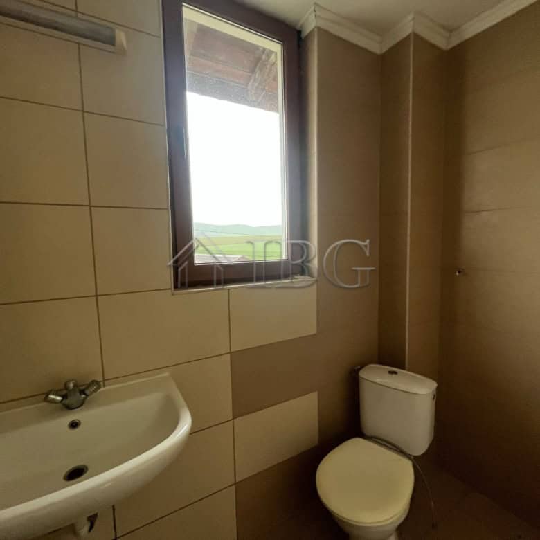 Bathroom with sink and toilet in a modern home in Aleksandrovo, Burgas region.
