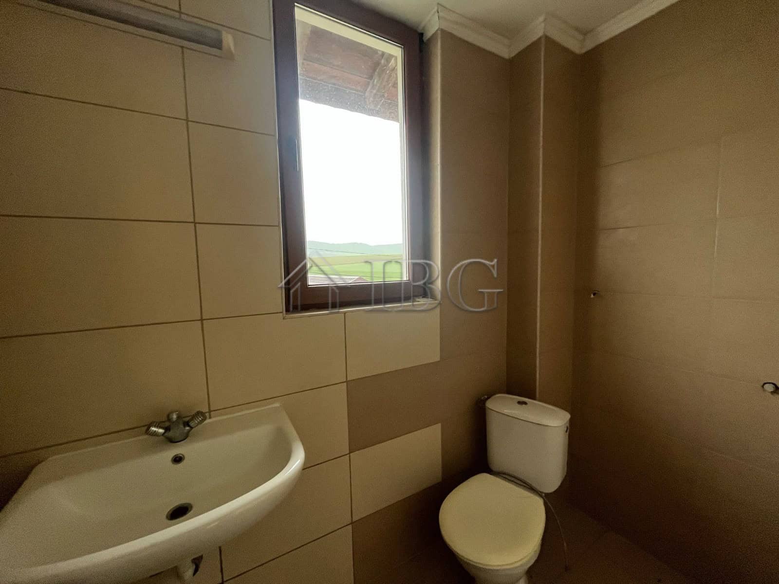 Bathroom with sink and toilet in a modern home in Aleksandrovo, Burgas region.