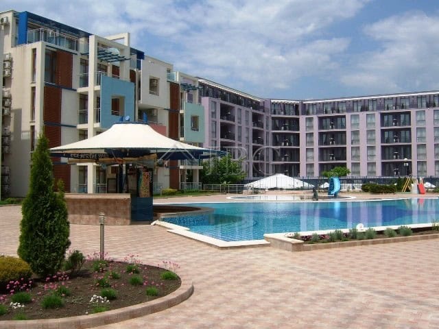 Furnished studio with separate kitchen and balcony overlooking the pool at Sun City 1, Sunny Beach.