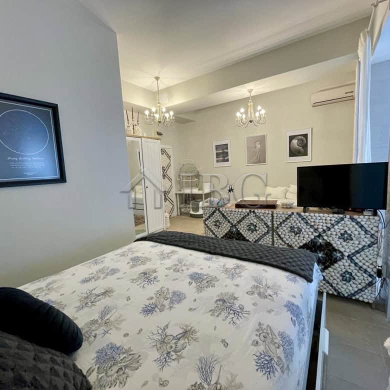 Bright interior of a 3-bedroom apartment in Sun Gate, Sunny Beach with yard and contemporary decor.
