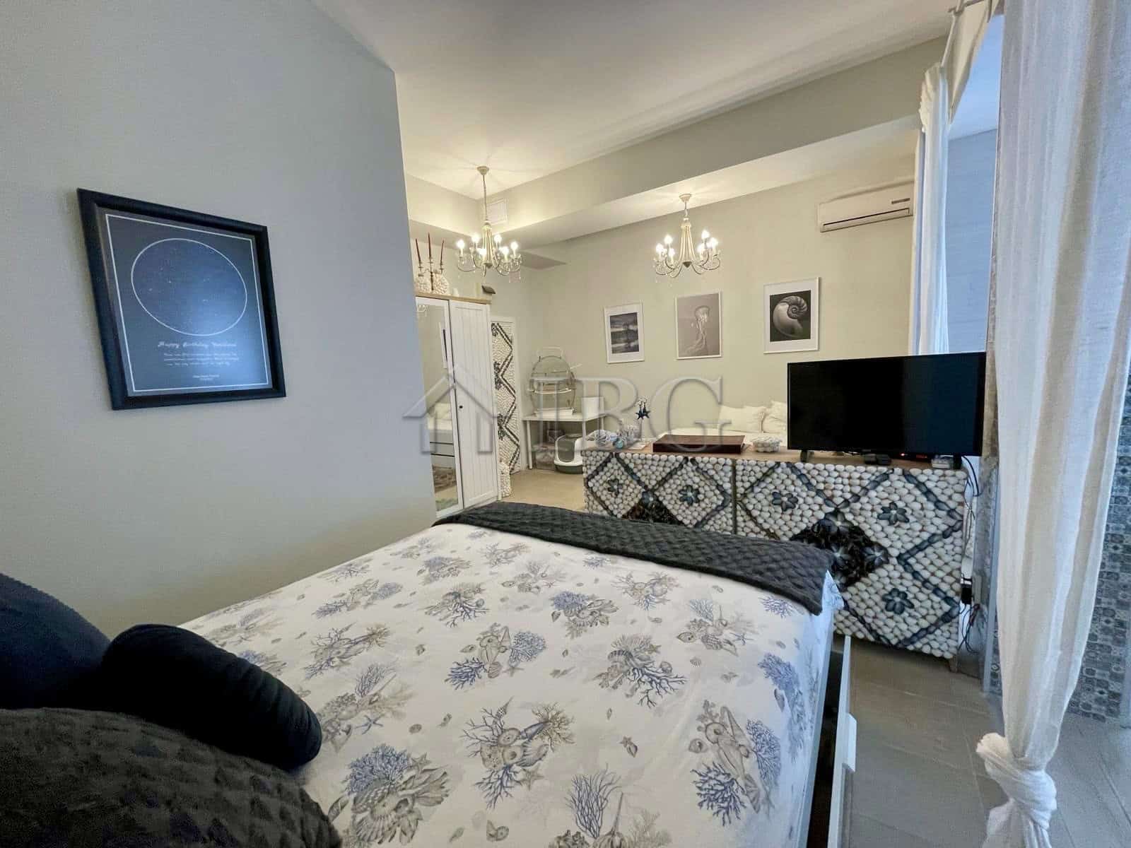 Bright interior of a 3-bedroom apartment in Sun Gate, Sunny Beach with yard and contemporary decor.