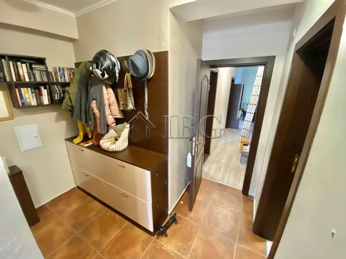 Cozy hallway with coat hooks and storage in Sveti Vlas, no maintenance fee.