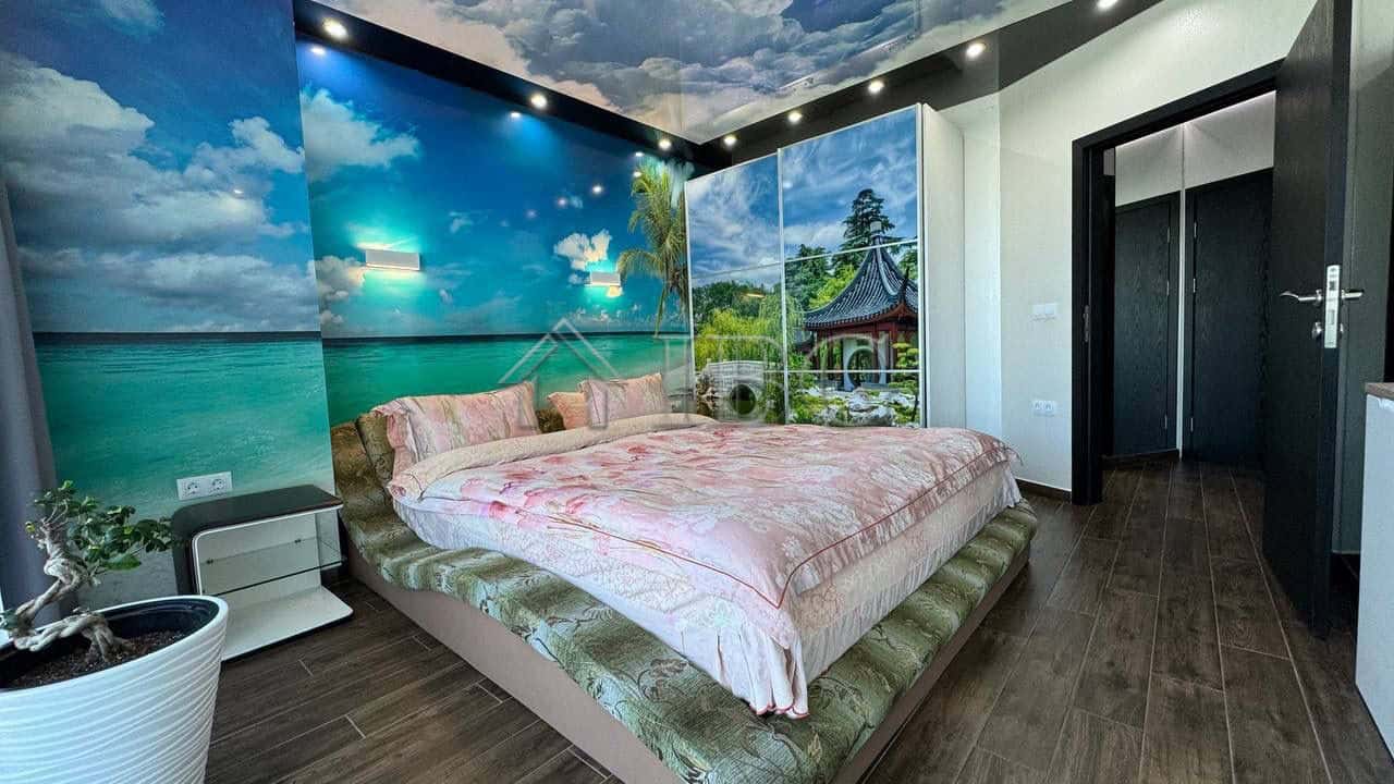Sea view bedroom with modern decor and ocean mural in Atlantis Resort & Spa, Sarafovo, Burgas.