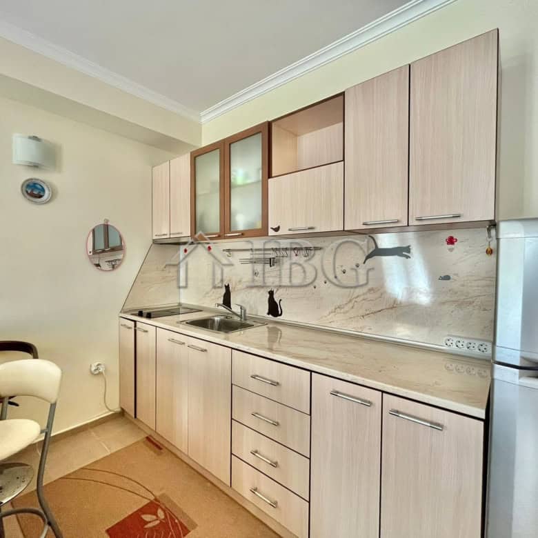 Apartment with pool view in Sveti Vlas, featuring a contemporary kitchen and cozy living space.