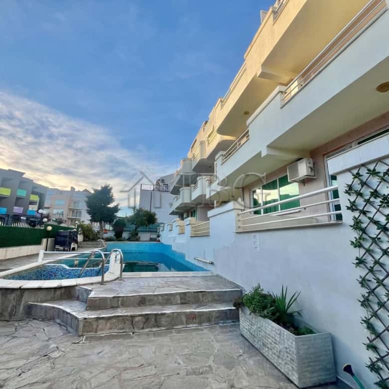 Spacious 2-bedroom apartment featuring a partial sea view, modern amenities, and a private pool in S.